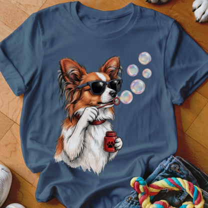 Dark blue t-shirt featuring an illustration of a dog wearing sunglasses and blowing soap bubbles.