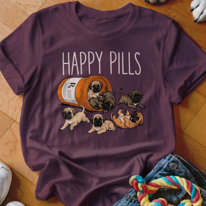 T-shirt with "Happy Pills" text and cartoon mastiff puppies spilling from a pill bottle.