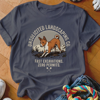 Basenji dog digging in dirt with "Unsolicited Landscaping Co." text.