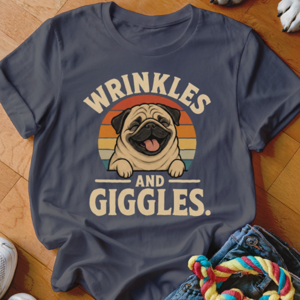 Dark blue t-shirt with a pug and the text "WRINKLES AND GIGGLES."