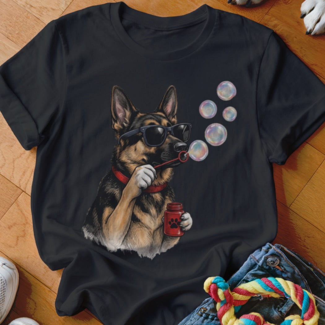 Black t-shirt featuring a graphic of a German Shepherd wearing sunglasses and blowing bubbles.
