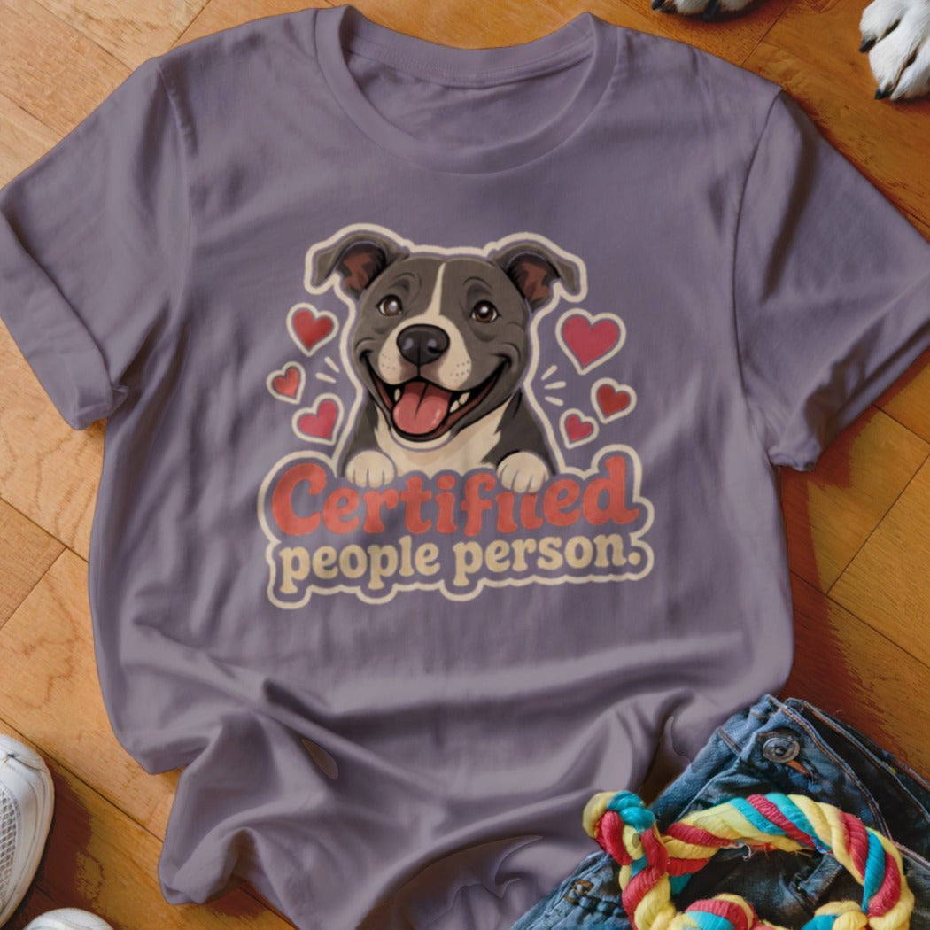 Purple t-shirt with a happy cartoon dog and "Certified people person" text.