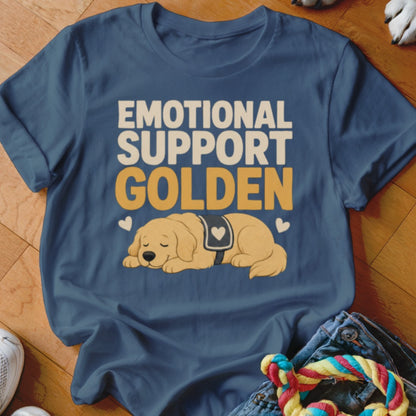 A dark blue t-shirt printed with the text Emotional Support Golden and an illustration of a sleeping golden retriever.