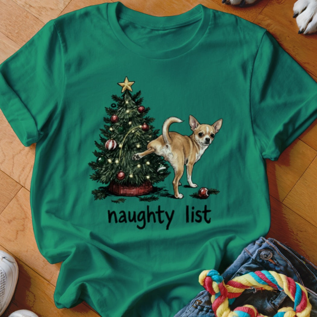 Green t-shirt with a Chihuahua marking a Christmas tree, text reads "naughty list".