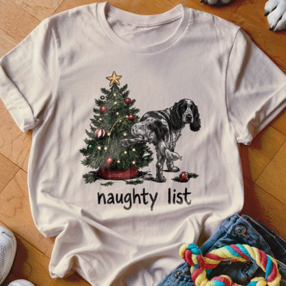 T-shirt with a Christmas tree and a dog with the words "naughty list"
