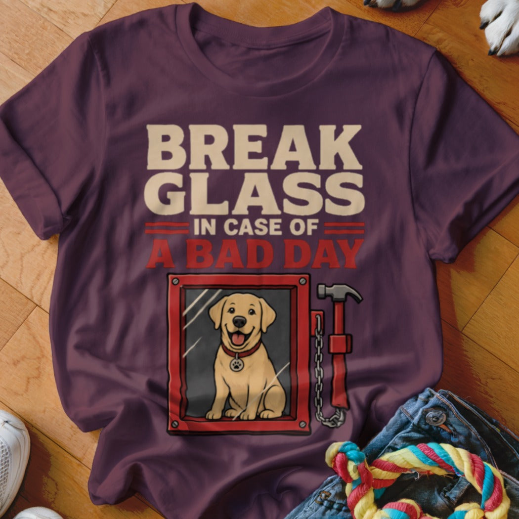 T-shirt with "BREAK GLASS IN CASE OF A BAD DAY" and a dog behind glass.