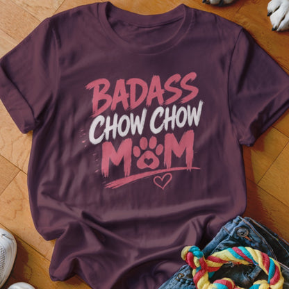Burgundy t-shirt with "BADASS CHOW CHOW MOM" text and paw print heart graphic.