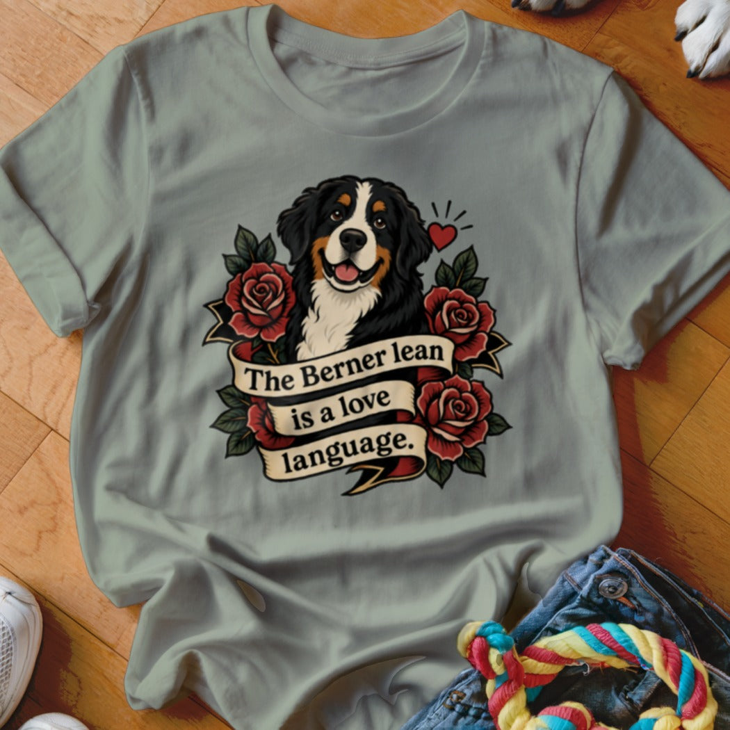 Bernese Mountain Dog with roses and banner text "The Berner lean is a love language."
