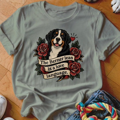 Bernese Mountain Dog with roses and banner text "The Berner lean is a love language."