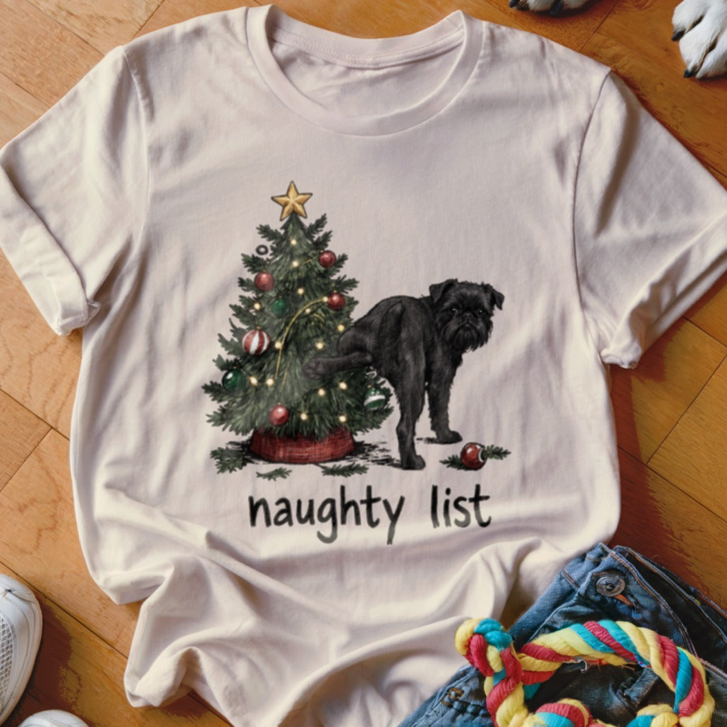Black dog peeing on Christmas tree with text "naughty list".