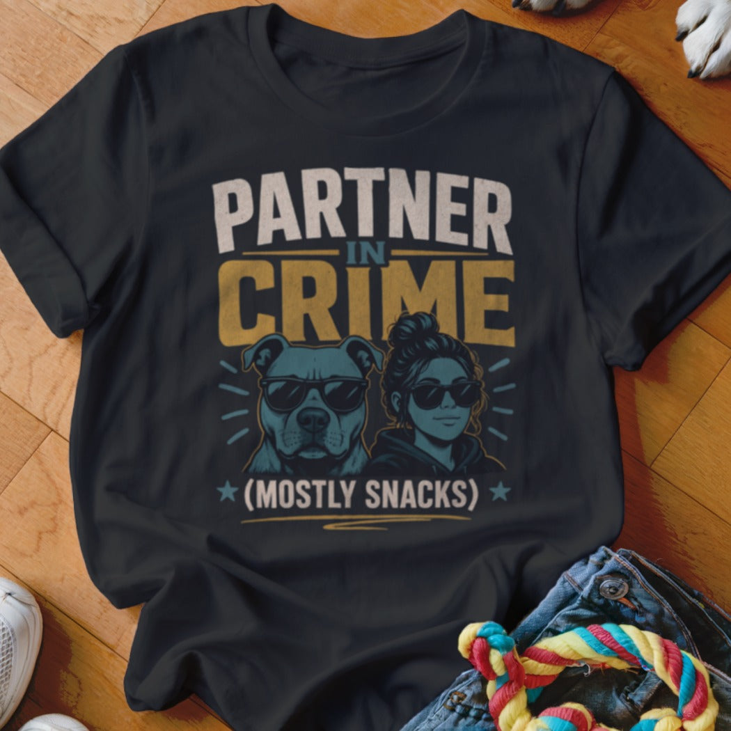 Black t-shirt with "PARTNER IN CRIME (MOSTLY SNACKS)" text, dog, and woman wearing sunglasses.