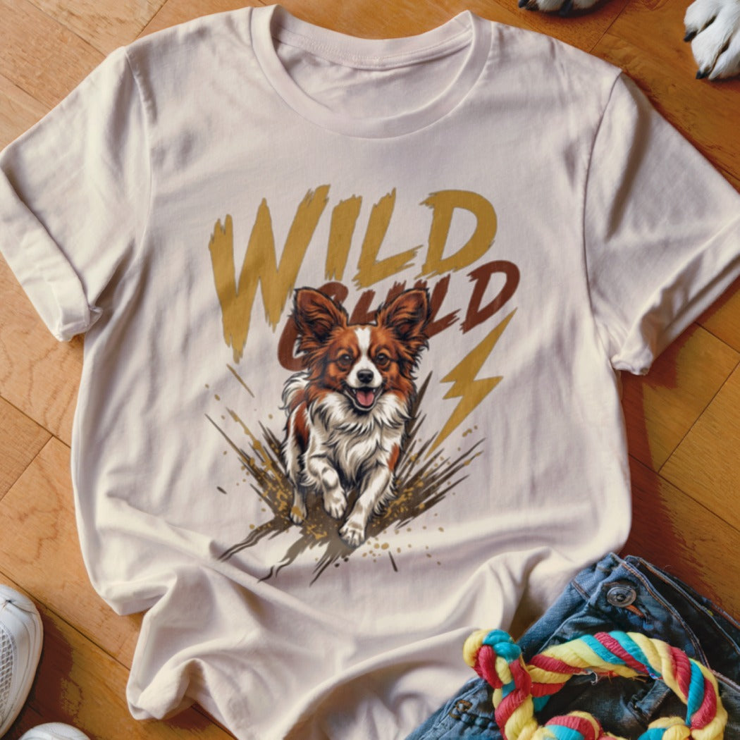 Light-colored crewneck t-shirt featuring a graphic of a running Papillon dog and the text Wild Child.
