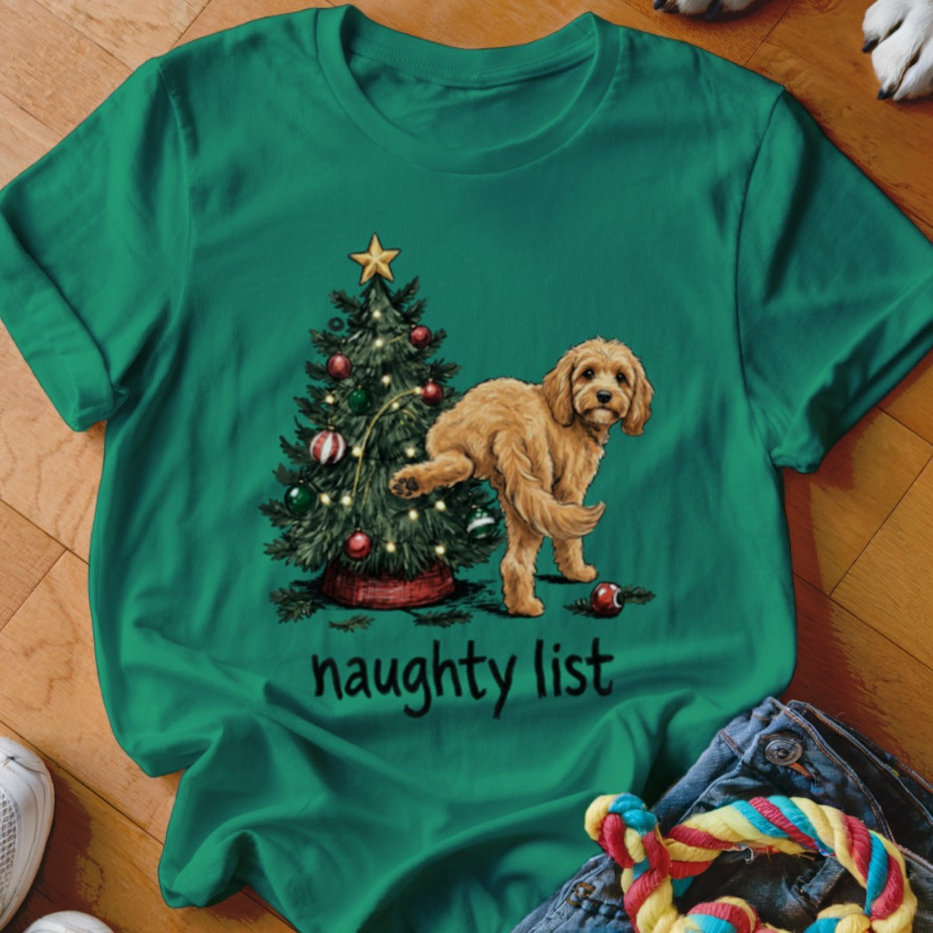 Goldendoodle pees on Christmas tree with "naughty list" text.