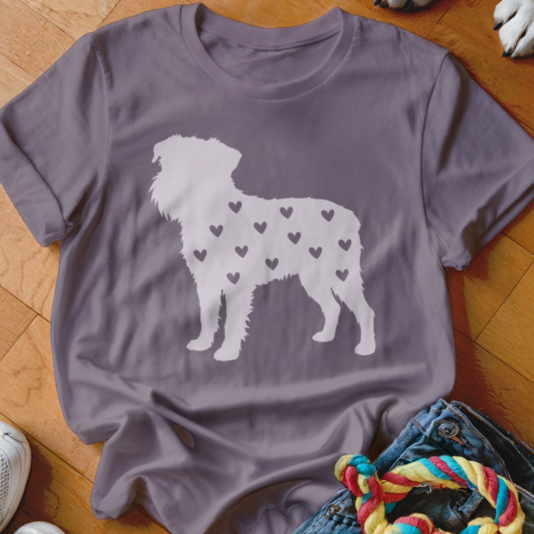 Gray t-shirt with white silhouette of a dog filled with small dark hearts.