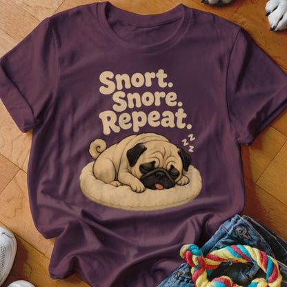 Purple t-shirt with illustration of sleeping pug and text "Snort. Snore. Repeat."