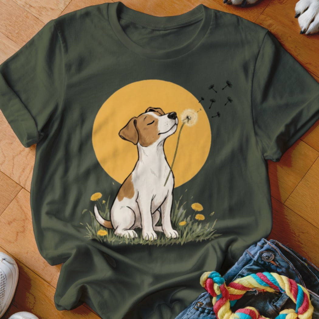 Dark green t-shirt featuring an illustration of a dog blowing dandelion seeds against a yellow circle background.