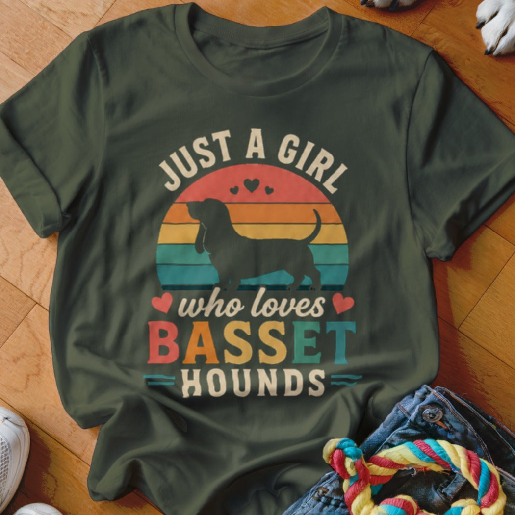 Dark green t-shirt with "Just a girl who loves Basset Hounds" text and Basset Hound silhouette.