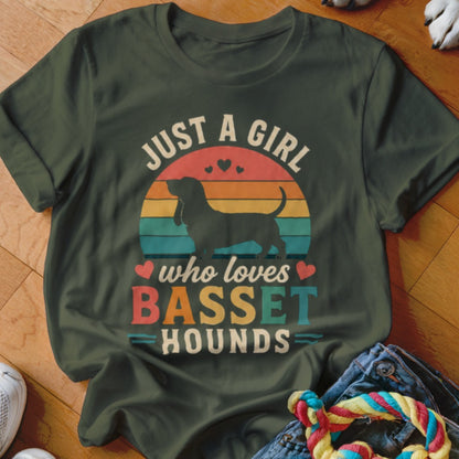 Dark green t-shirt with "Just a girl who loves Basset Hounds" text and Basset Hound silhouette.
