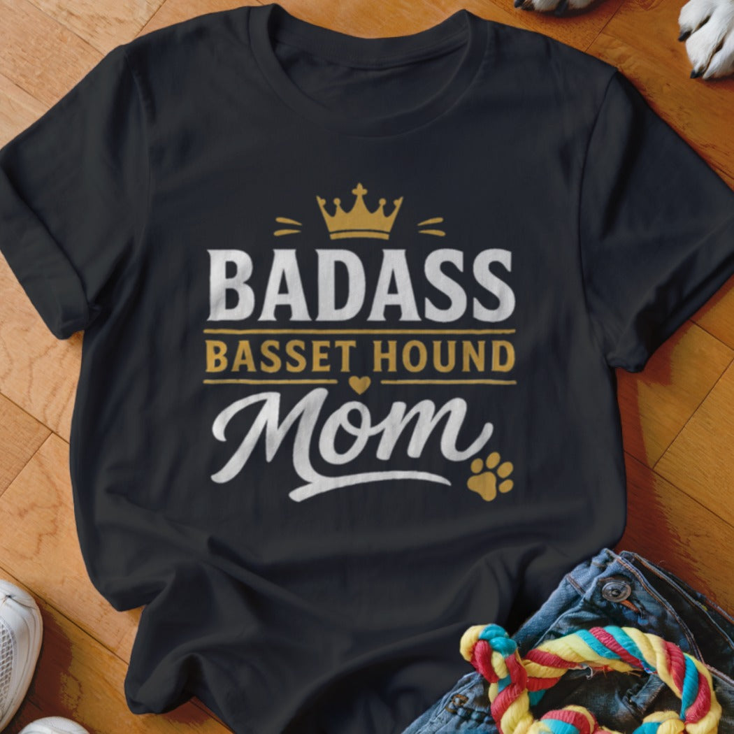 Black t-shirt with "Badass Basset Hound Mom" text and paw print graphic.