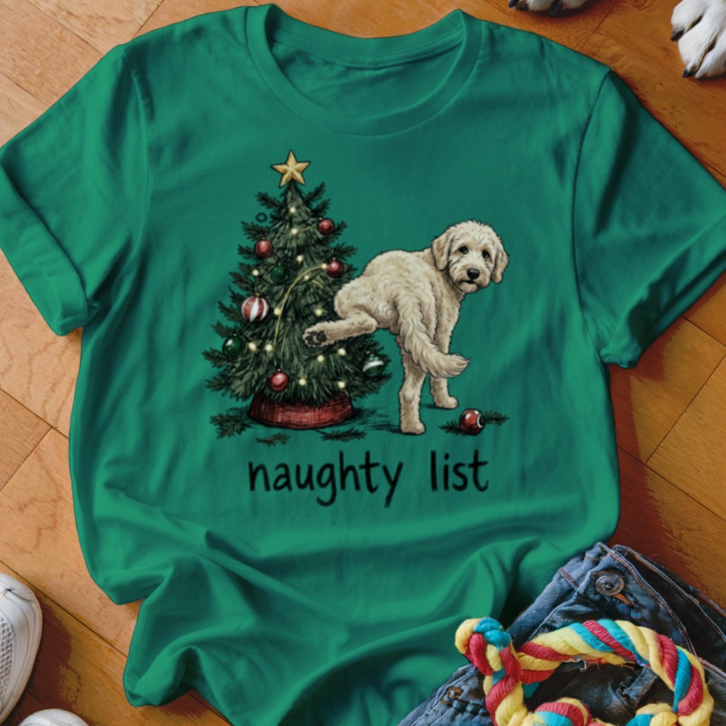 Cream dog peeing on Christmas tree with text "naughty list".