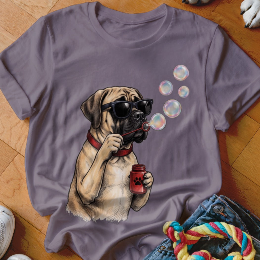 A gray crewneck t-shirt featuring a graphic of a mastiff dog wearing sunglasses and blowing bubbles.