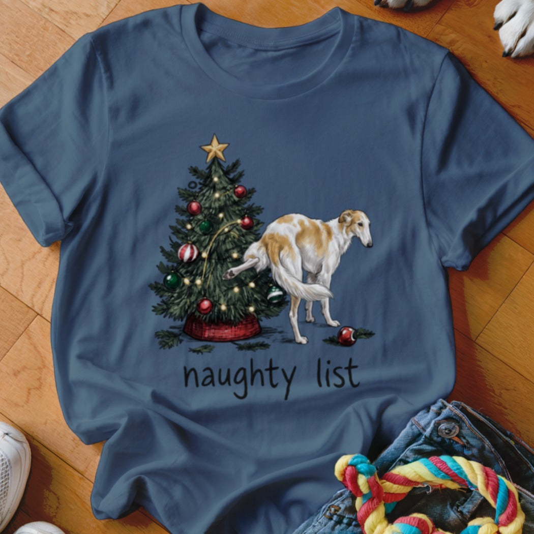 Slate blue t-shirt featuring a Borzoi dog lifting its leg on a Christmas tree with the text "naughty list".