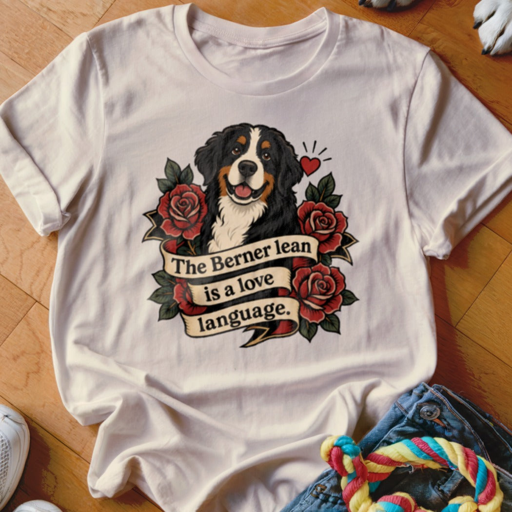 White t-shirt with Bernese Mountain Dog, roses, and text "The Berner lean is a love language."