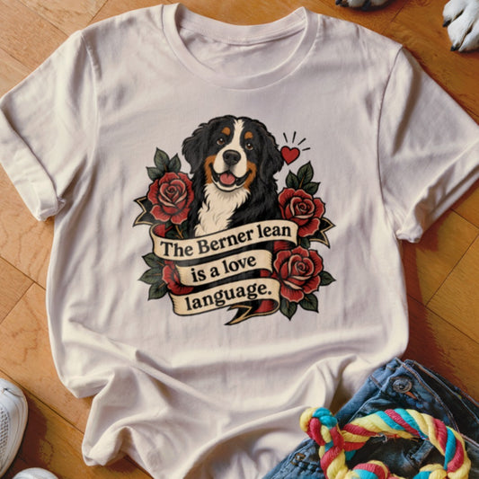 White t-shirt with Bernese Mountain Dog, roses, and text "The Berner lean is a love language."