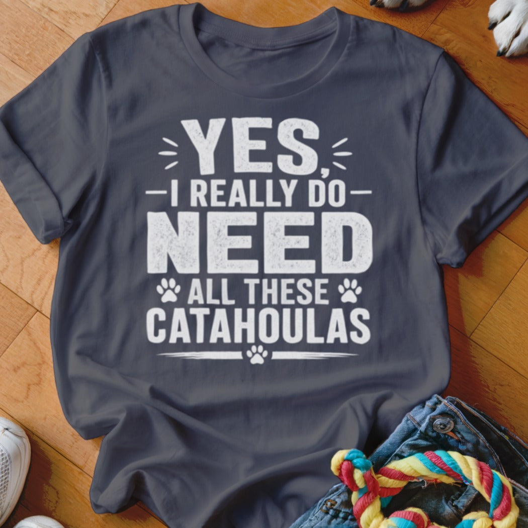 Dark grey t-shirt with "YES, I REALLY DO NEED ALL THESE CATAHOULAS" text.