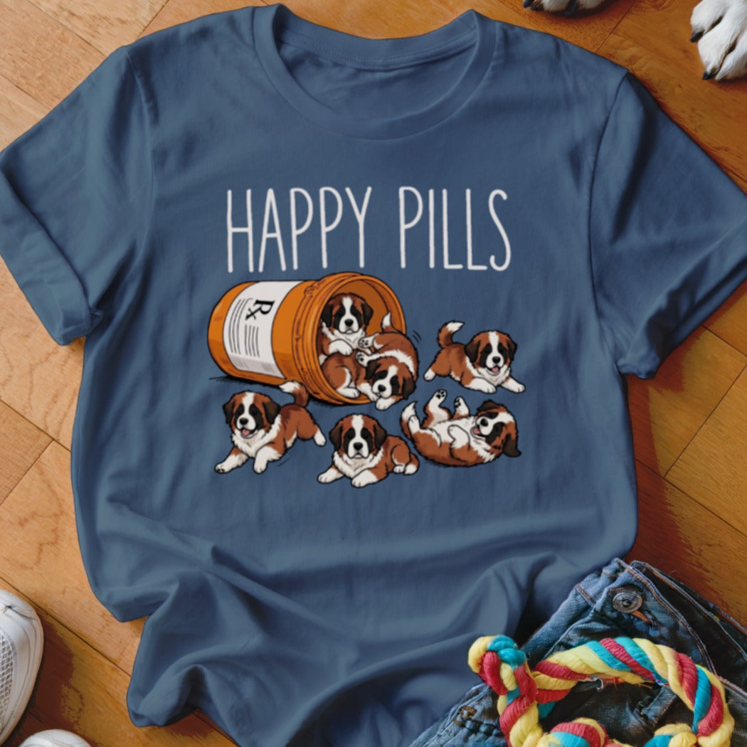 T-shirt with "HAPPY PILLS" text and Saint Bernard puppies spilling from a medicine bottle.