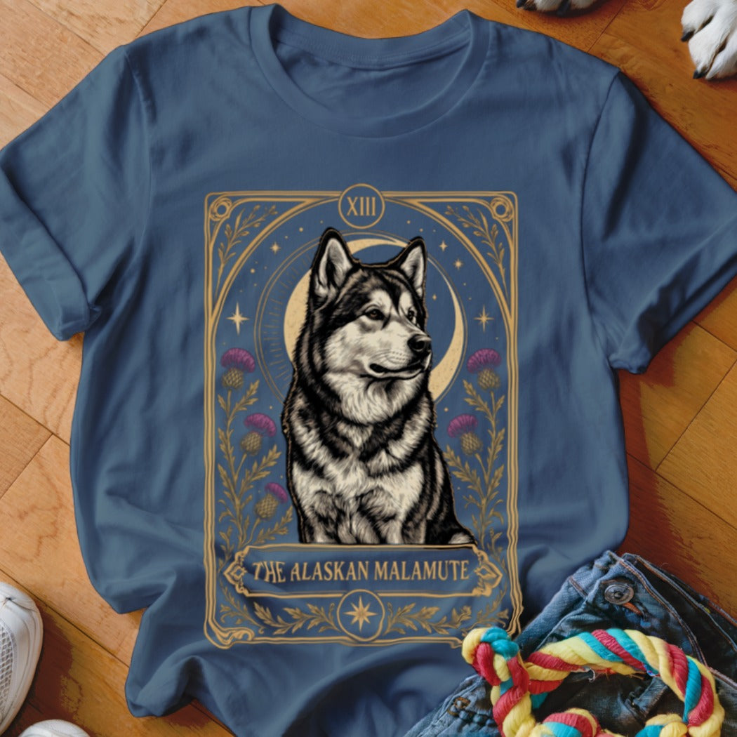 Blue t-shirt featuring an Alaskan Malamute in tarot card style with flowers and moon graphic.