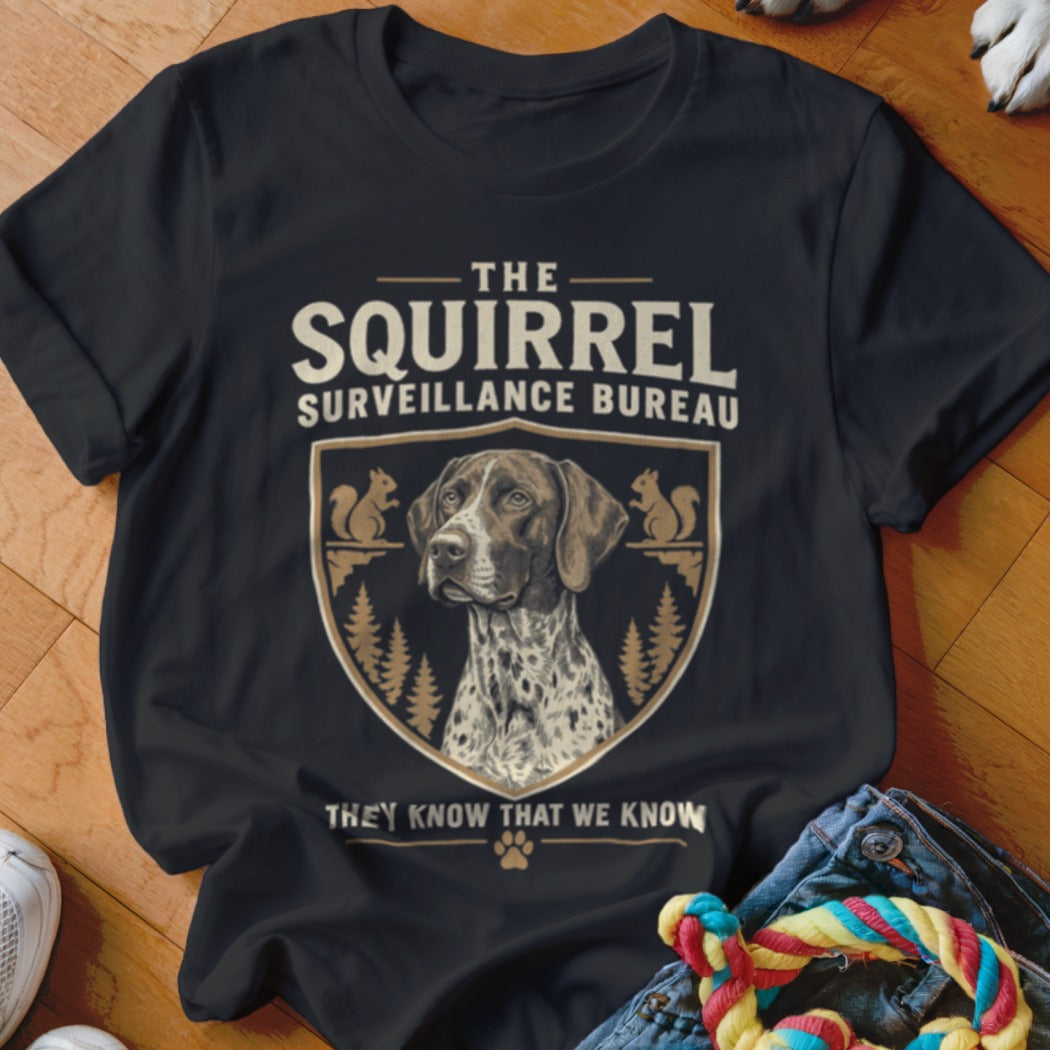 Black t-shirt featuring a German Shorthaired Pointer graphic and text reading The Squirrel Surveillance Bureau.