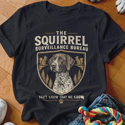 Black t-shirt featuring a German Shorthaired Pointer graphic and text reading The Squirrel Surveillance Bureau.