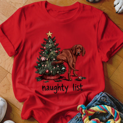 Red t-shirt with a Christmas tree and a brown dog, text reads "naughty list".