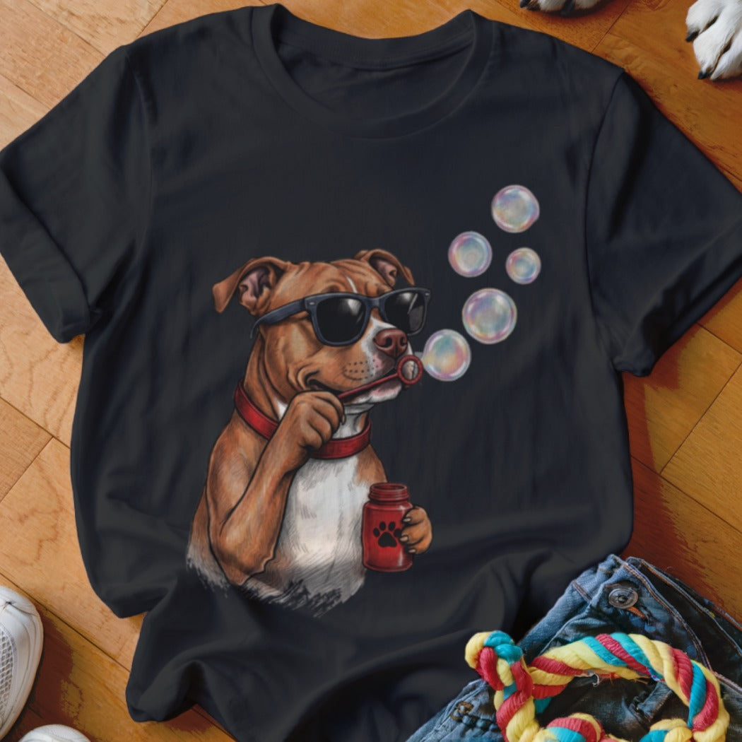 Black t-shirt featuring a graphic of a brown dog wearing sunglasses and blowing soap bubbles.