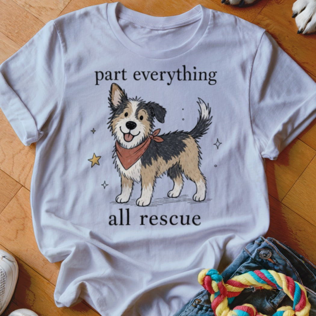 White t-shirt with cartoon dog wearing bandana, text "part everything all rescue".
