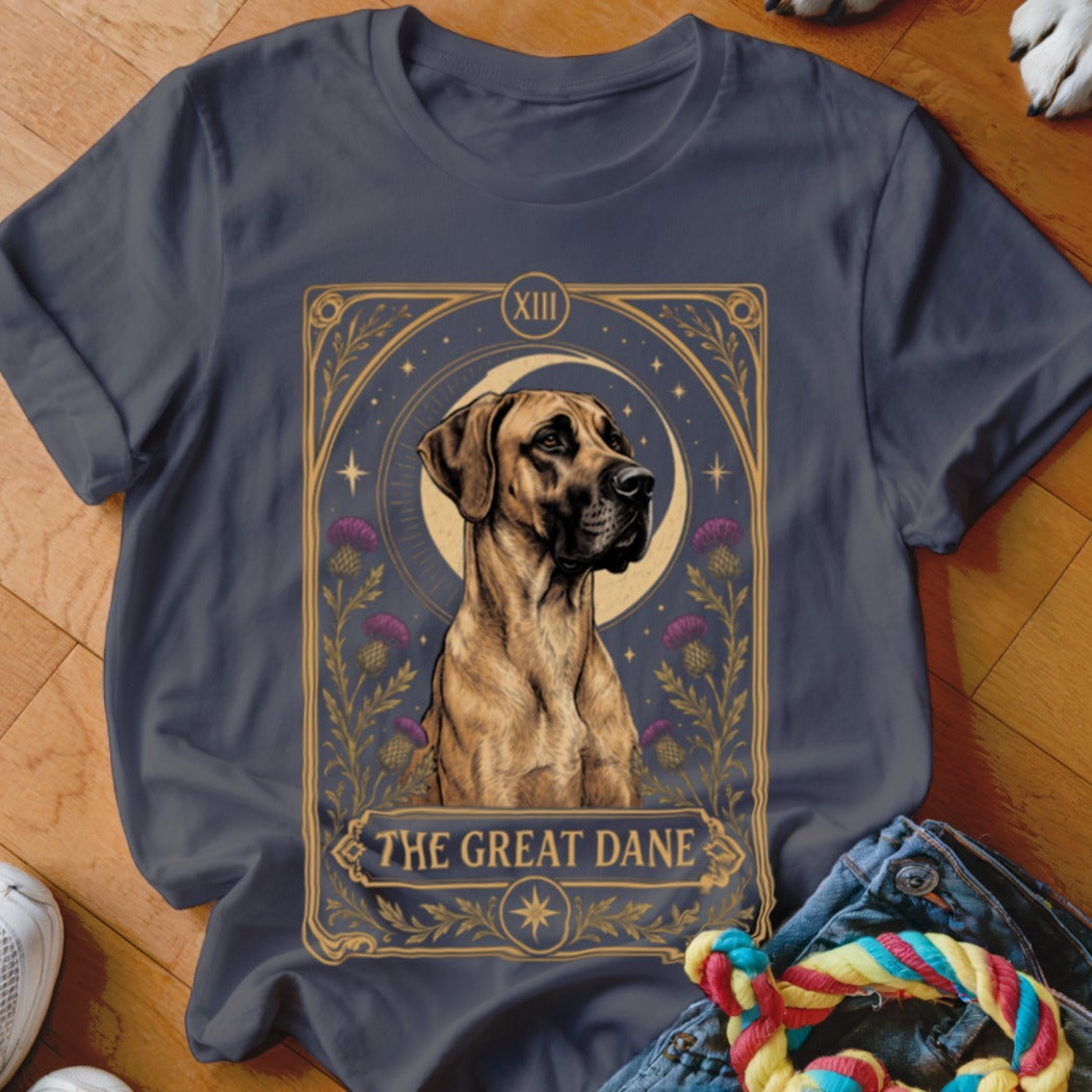 A dark gray t-shirt featuring a tarot-style graphic of a Great Dane with purple flowers and a crescent moon.