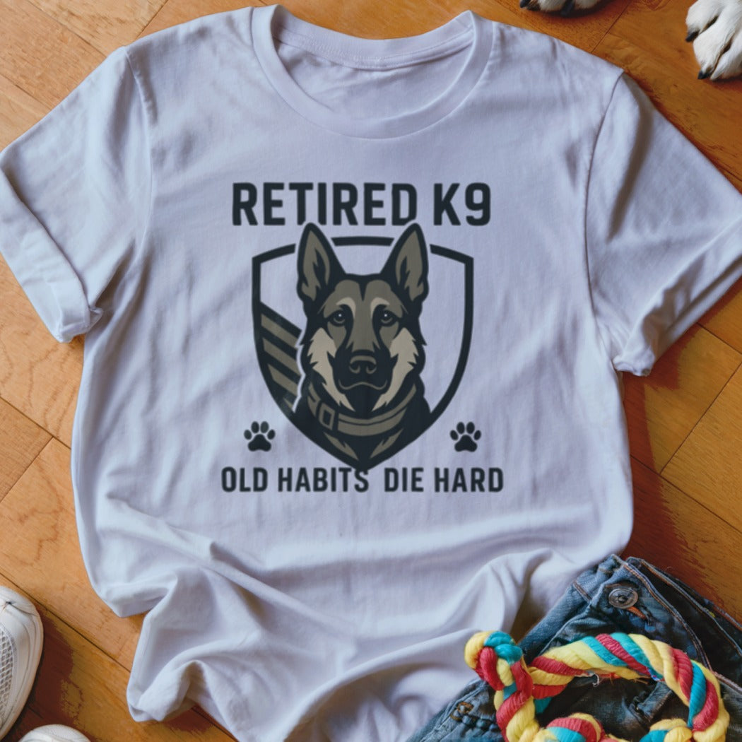 White t-shirt with "Retired K9 Old Habits Die Hard" and German Shepherd graphic.