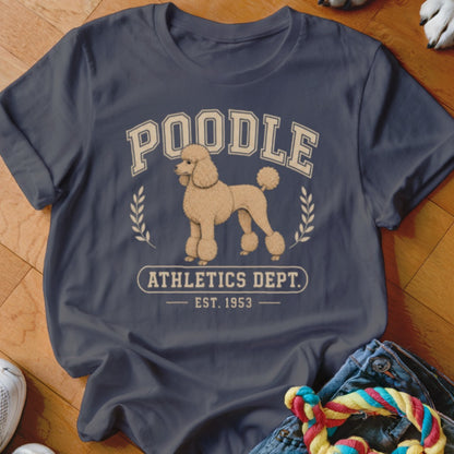 Navy t-shirt with a tan poodle graphic and "POODLE ATHLETICS DEPT. EST. 1953" text.