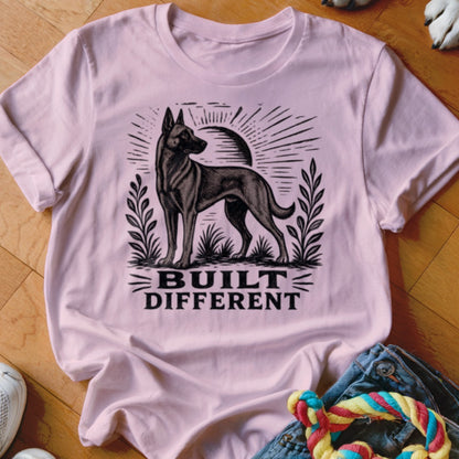 Pink t-shirt with dog illustration and "BUILT DIFFERENT" text.