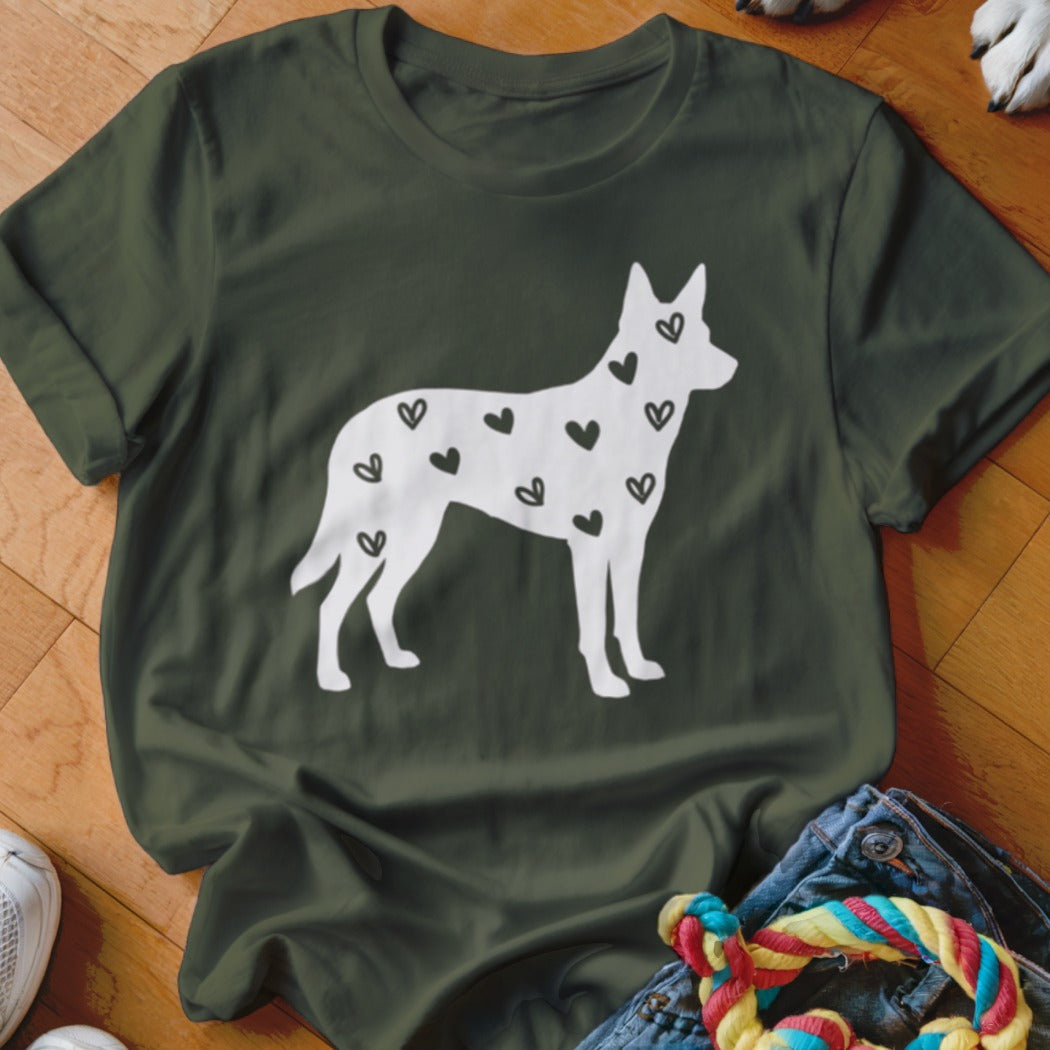 Olive t-shirt with white dog silhouette filled with black hearts.