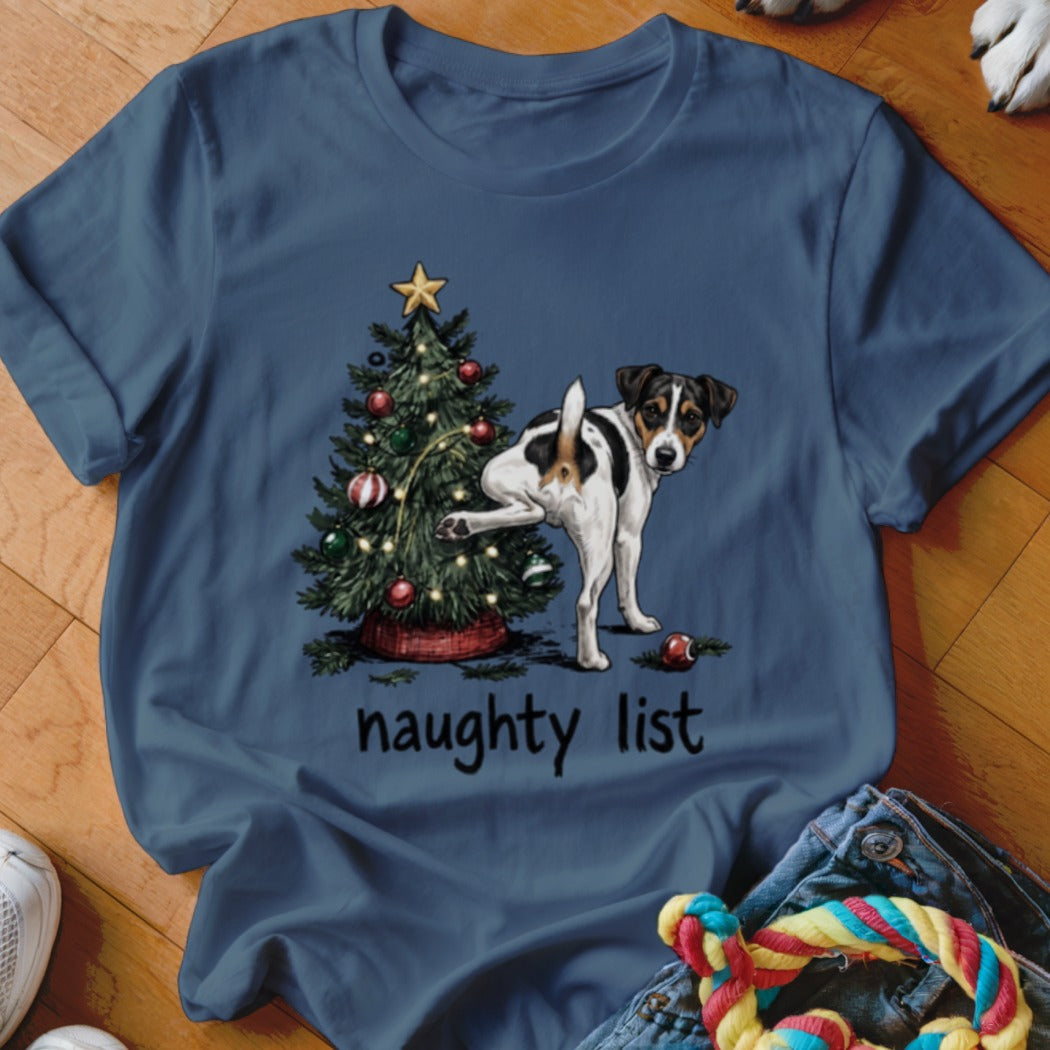 Jack Russell terrier near a Christmas tree with text "naughty list".