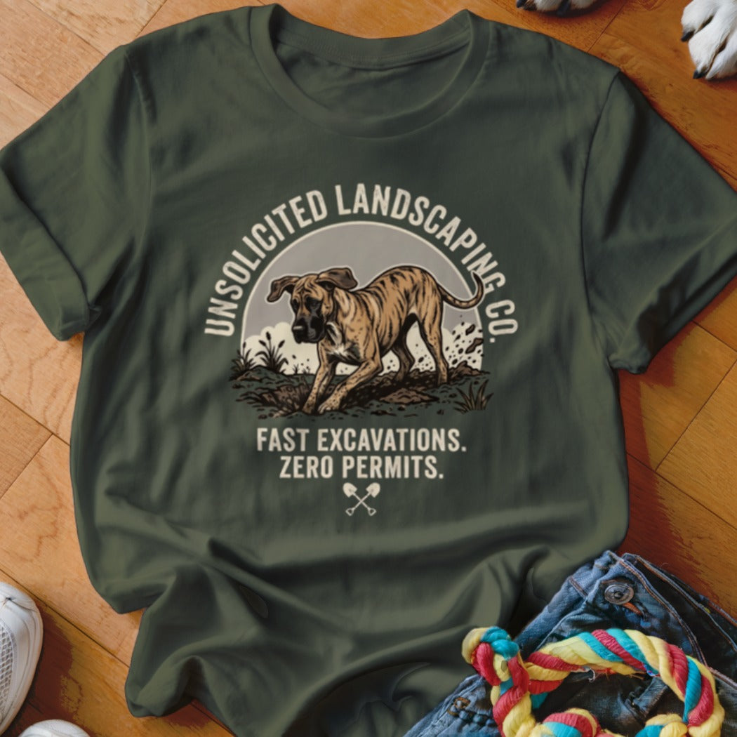 Green t-shirt with a dog digging, reads "Unsolicited Landscaping Co. Fast Excavations. Zero Permits."