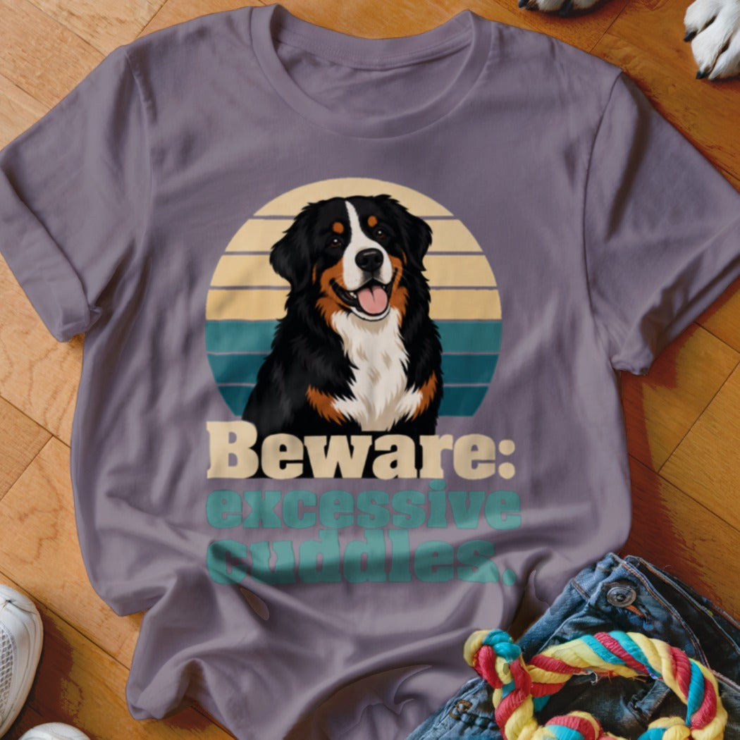 Bernese Mountain Dog graphic on t-shirt with text "Beware: excessive cuddles".