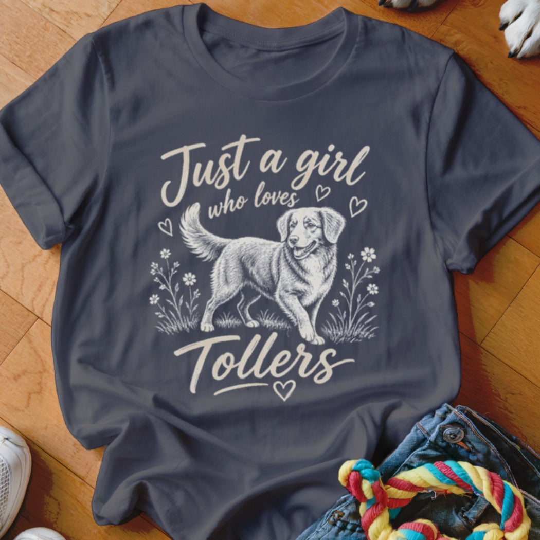 Dark blue t-shirt with "Just a girl who loves Tollers" and a dog illustration.