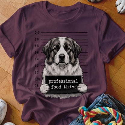 Saint Bernard dog in mugshot holding a "professional food thief" sign.
