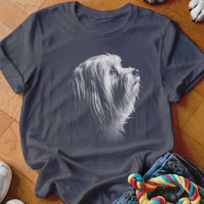 Dark grey t-shirt with a white fluffy dog portrait printed on the chest.