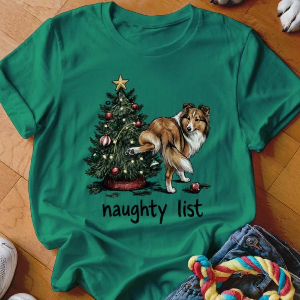 Green t-shirt with a Shetland sheepdog near a Christmas tree and text "naughty list".