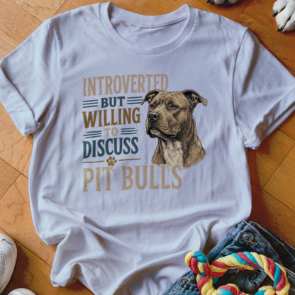 White t-shirt with text "Introverted But Willing To Discuss Pit Bulls" and a pit bull illustration.