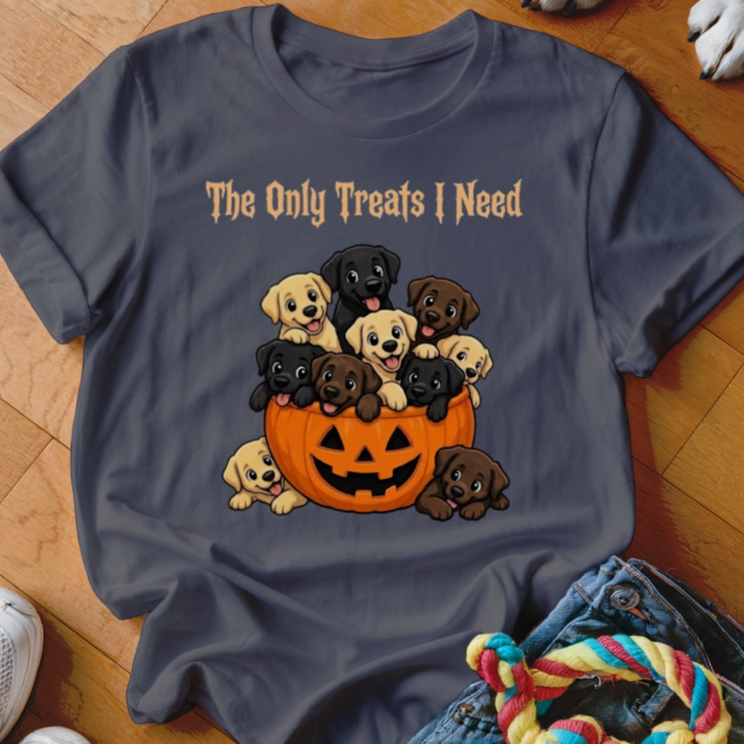 Puppies spilling out of a jack-o'-lantern with text "The Only Treats I Need".